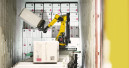 Im Bauhaus-Zentrallager erledigen Roboter den Wareneingang